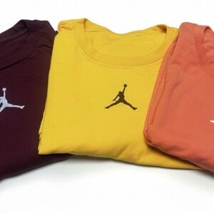 Jordan short sleeve ts in  Yellow, Maroon, and Orange. Size Large